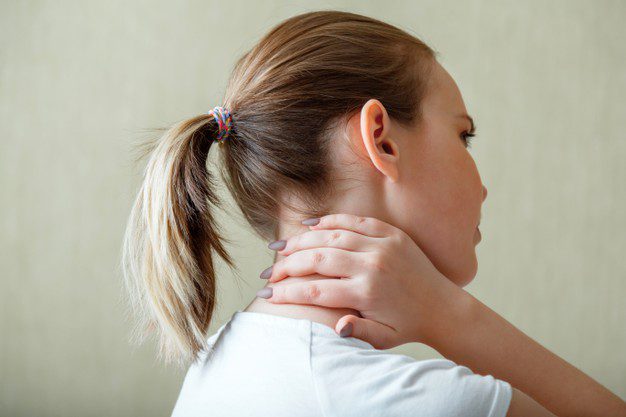 neck shoulder pain cervical vertebrae woman holds neck with pain cervical muscle spasm by hand disease musculoskeletal system young woman health care medical concept 221542 1379