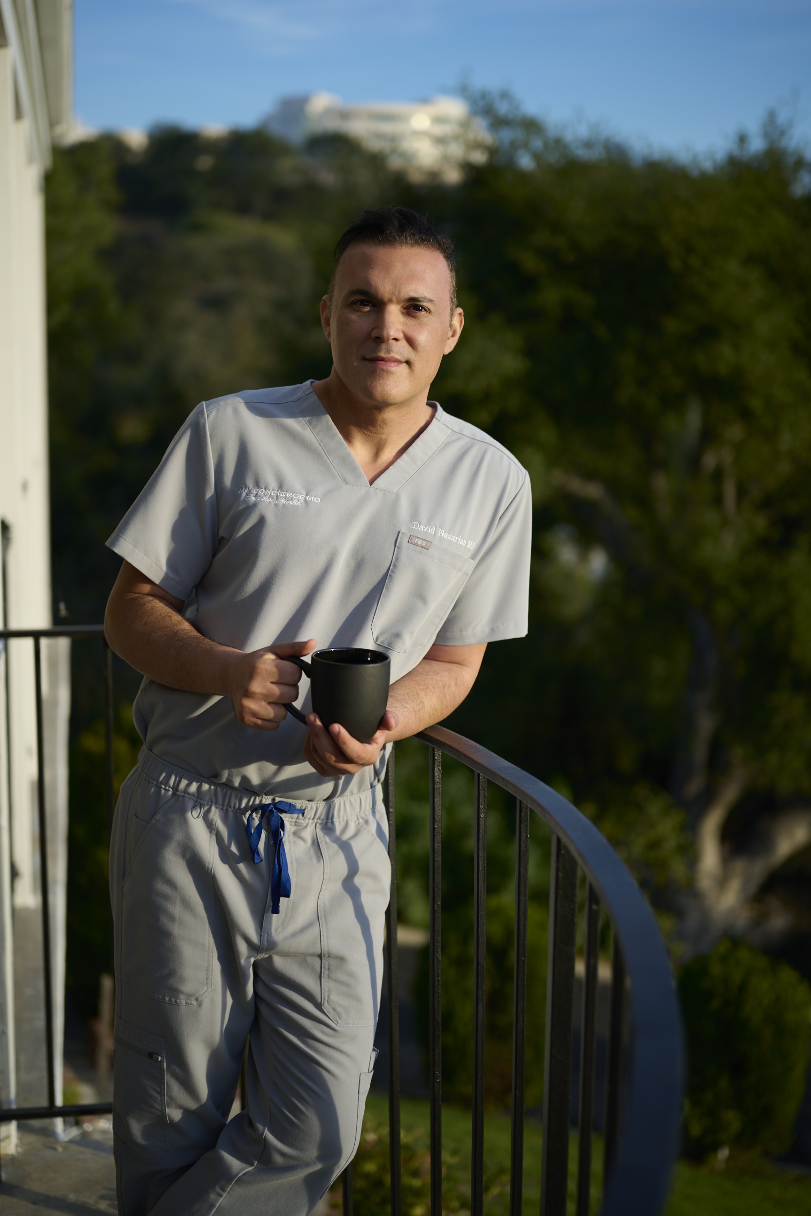 Dr. David Nazarian, MD, wearing medical scrubs