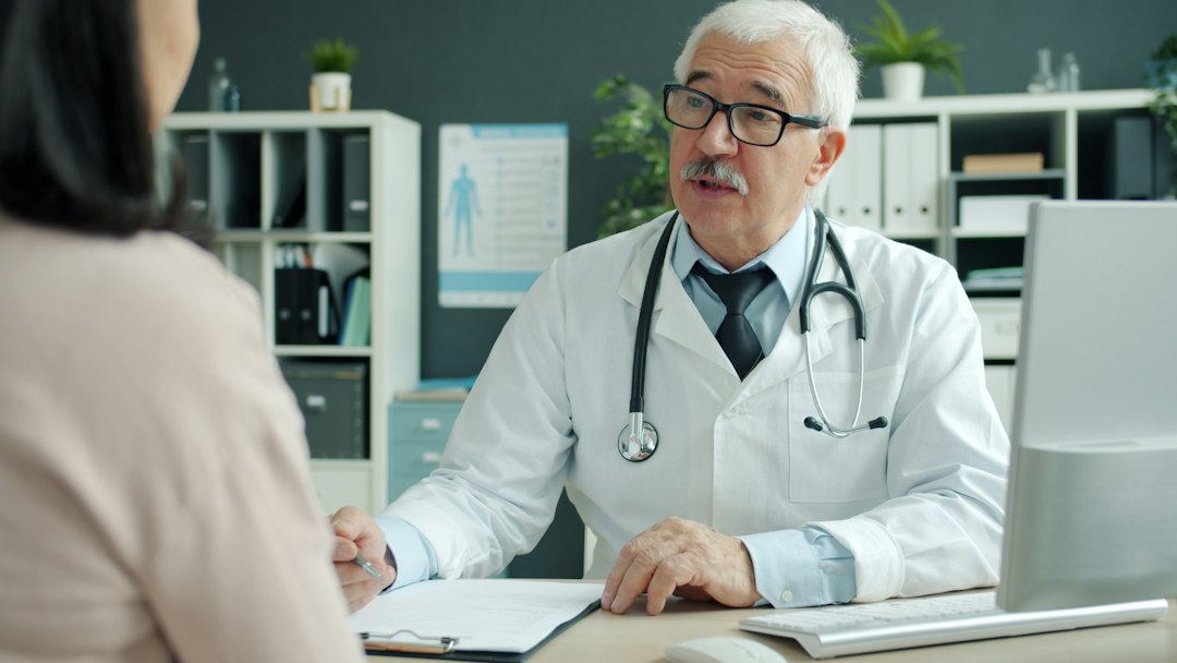 Physician consultation discussing individualized bioidentical hormone replacement therapy